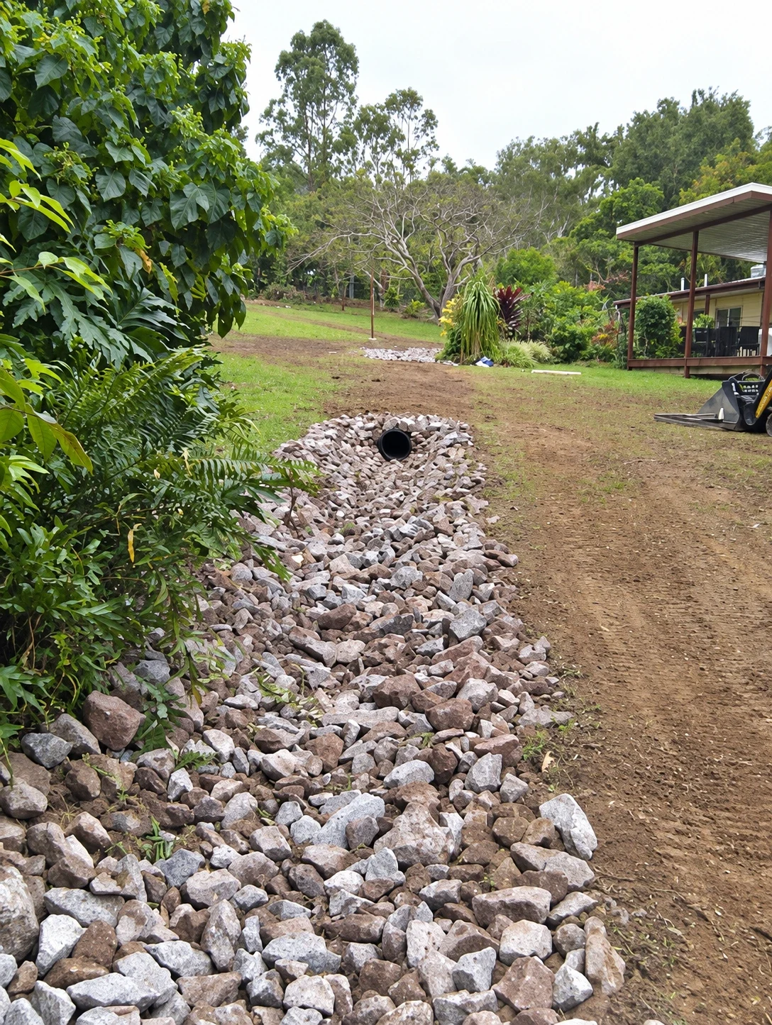 Rock-lined drainage channel